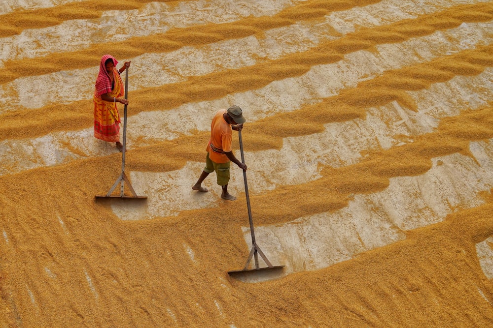 a man and woman in a desert