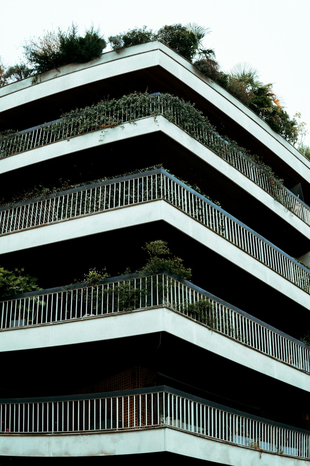 a large white building with a staircase