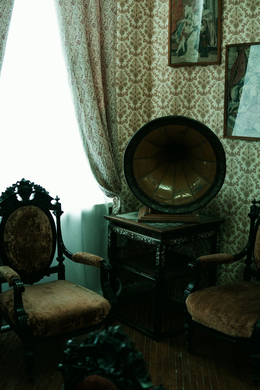 a room with a mirror and chairs