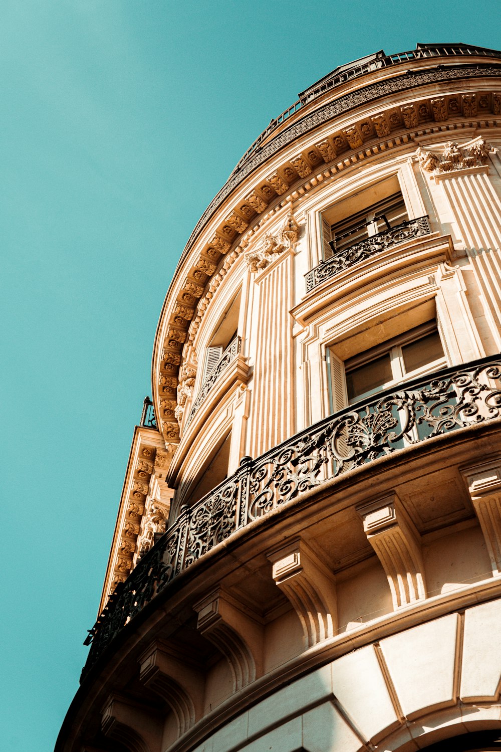 a tall building with a balcony