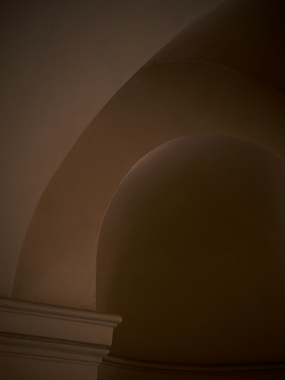 a white ceiling with a round light