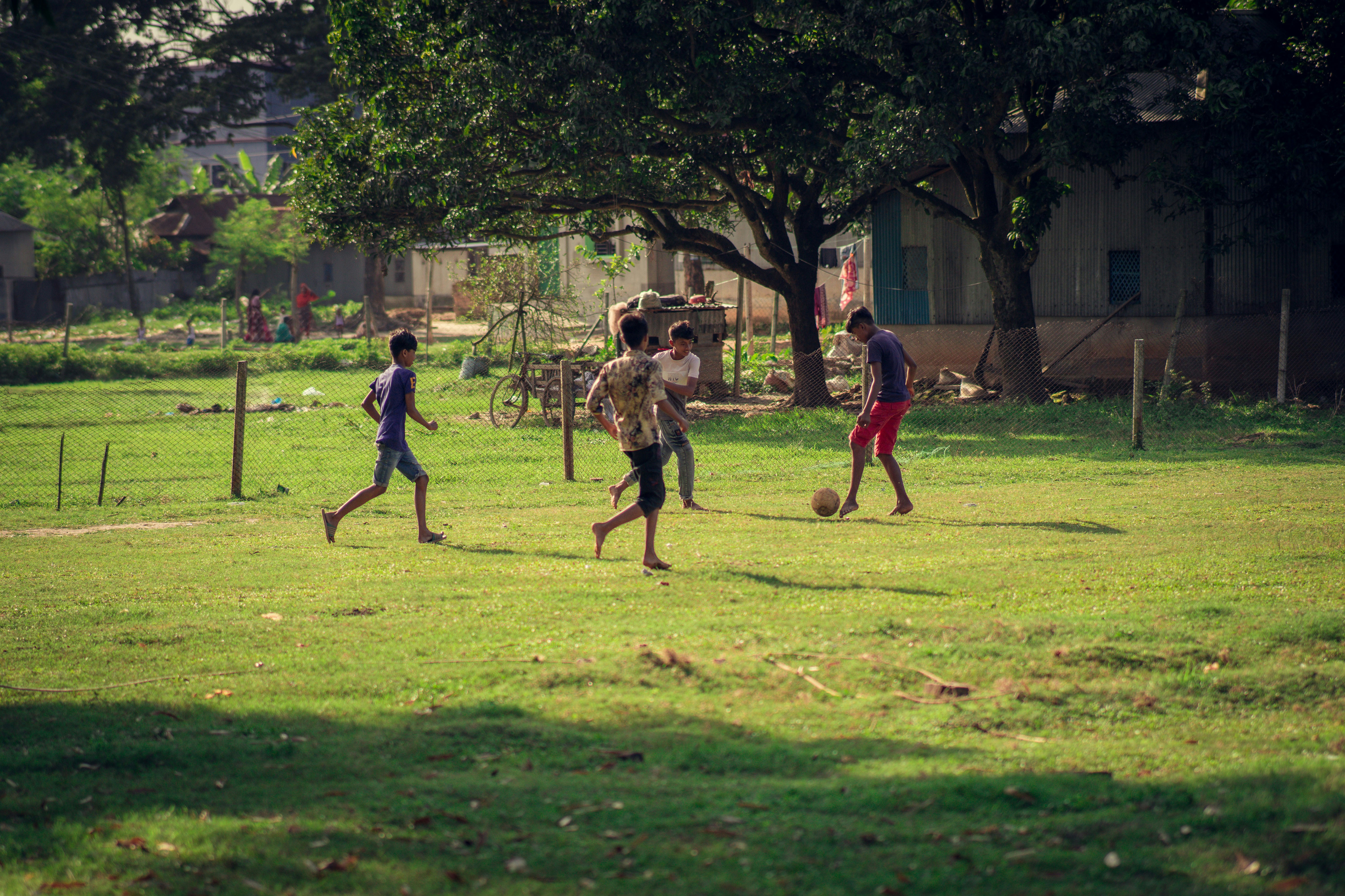 a group of people playing football