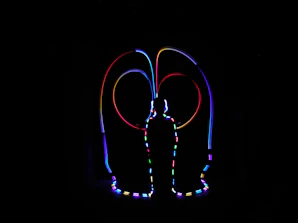 Two glowing kundlis side by side with cosmic patterns connecting them.