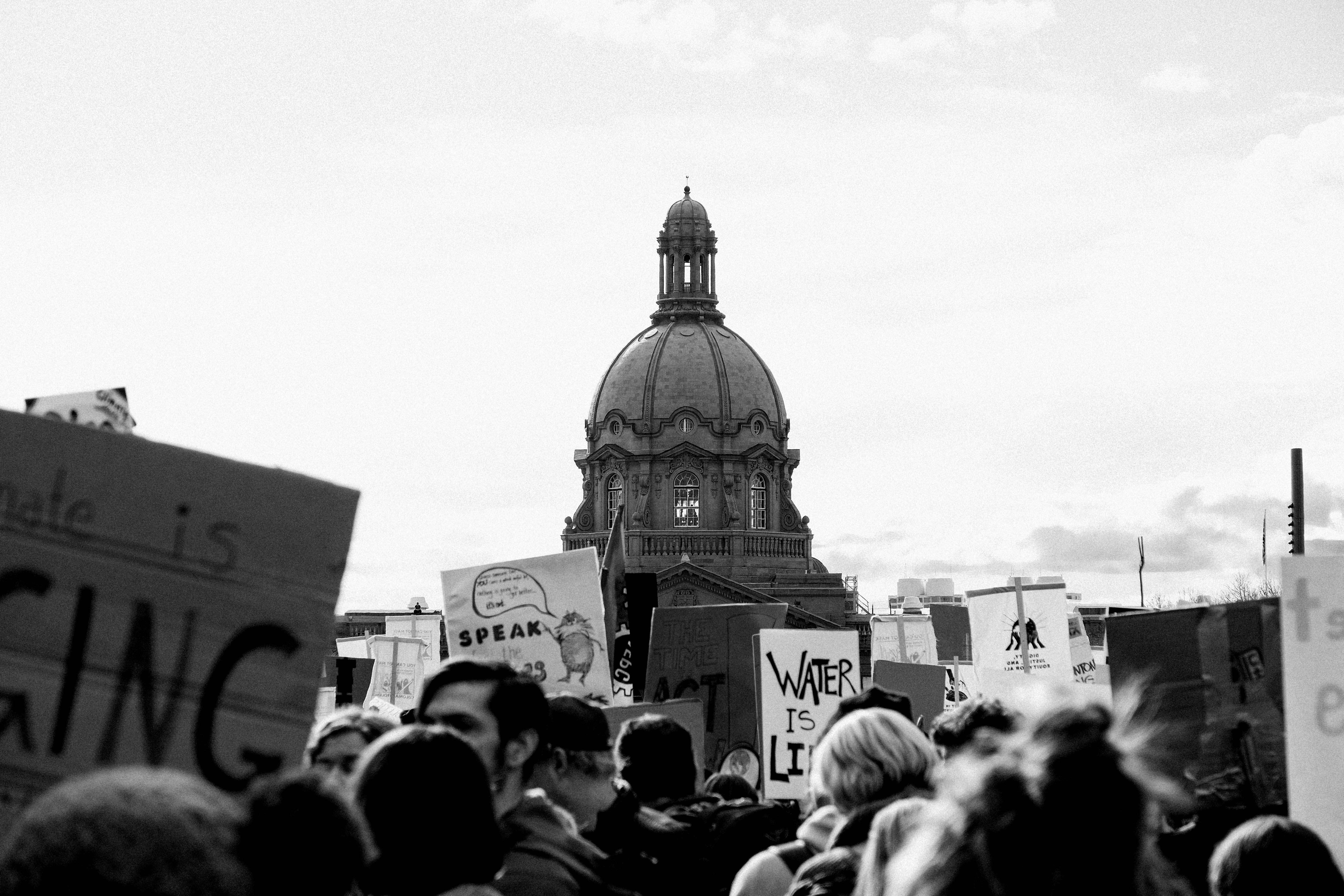 a crowd of people in front of a building