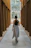 a person walking in a hallway