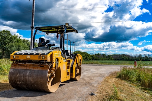 a large yellow vehicle on a road