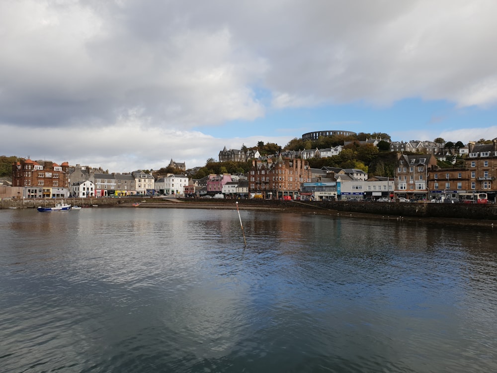 a body of water with buildings along it