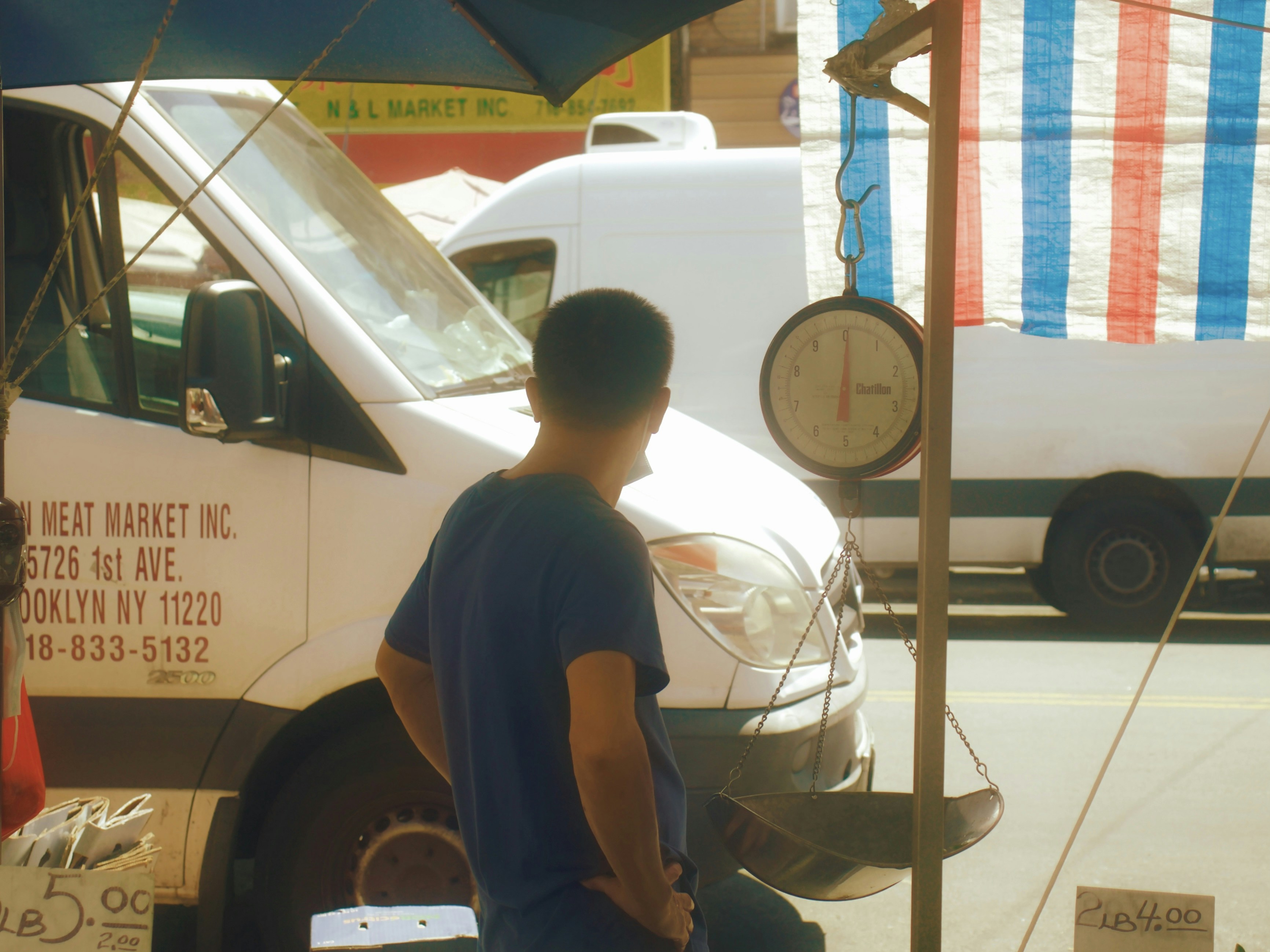 A satisfied business owner in front of a mobile cooler trailer - portable refrigeration Akron OH