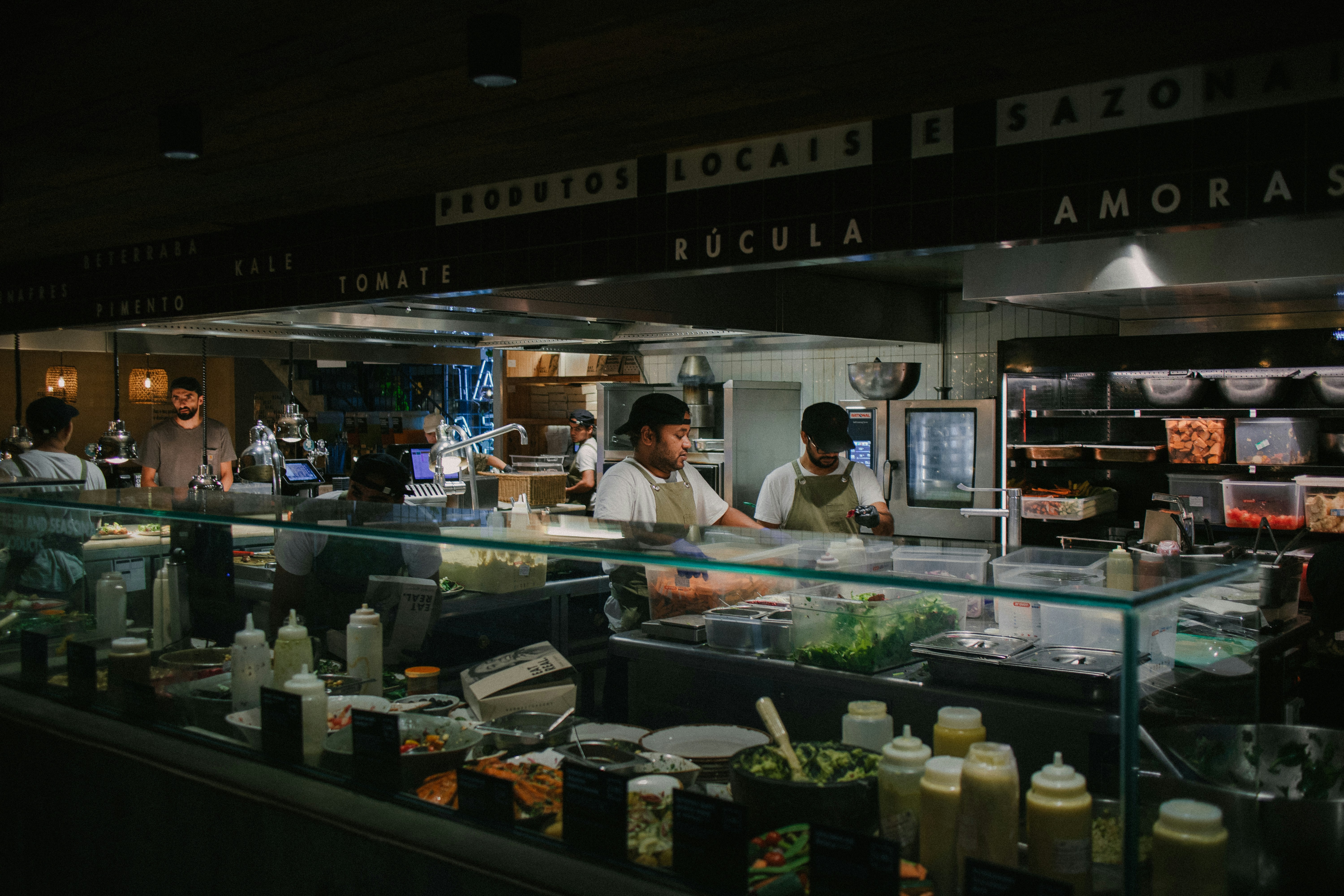 a group of chefs in a kitchen
