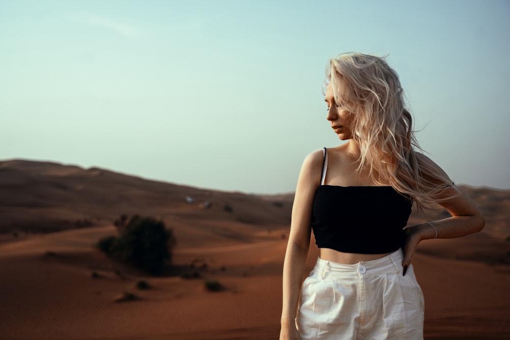 a person standing in a desert