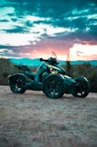 a motorcycle parked on a dirt road