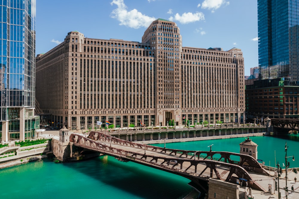 a bridge over a river in a city