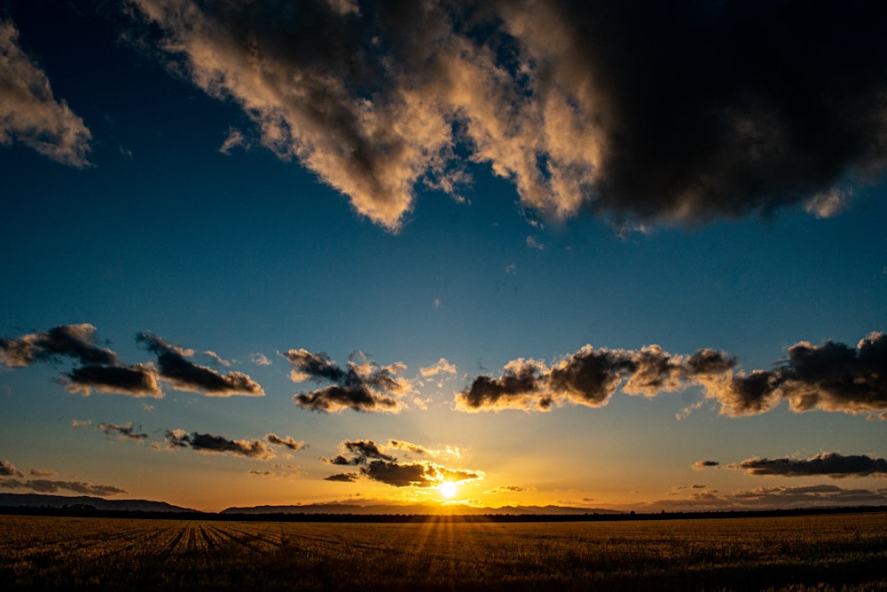 a sunset with clouds