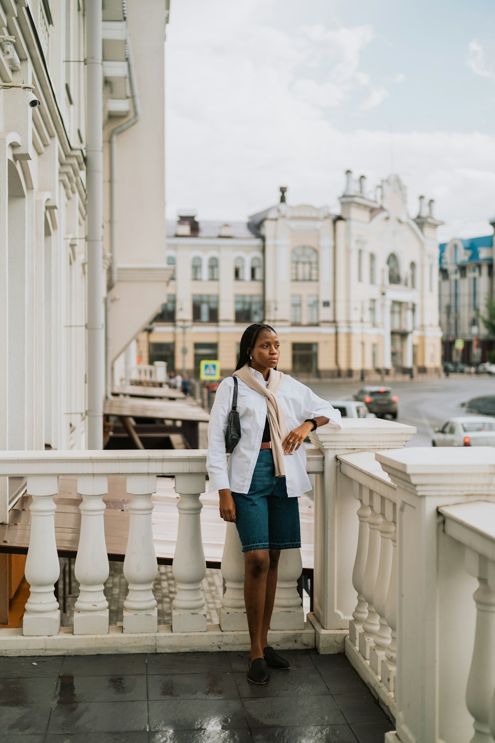 a person standing on a bridge