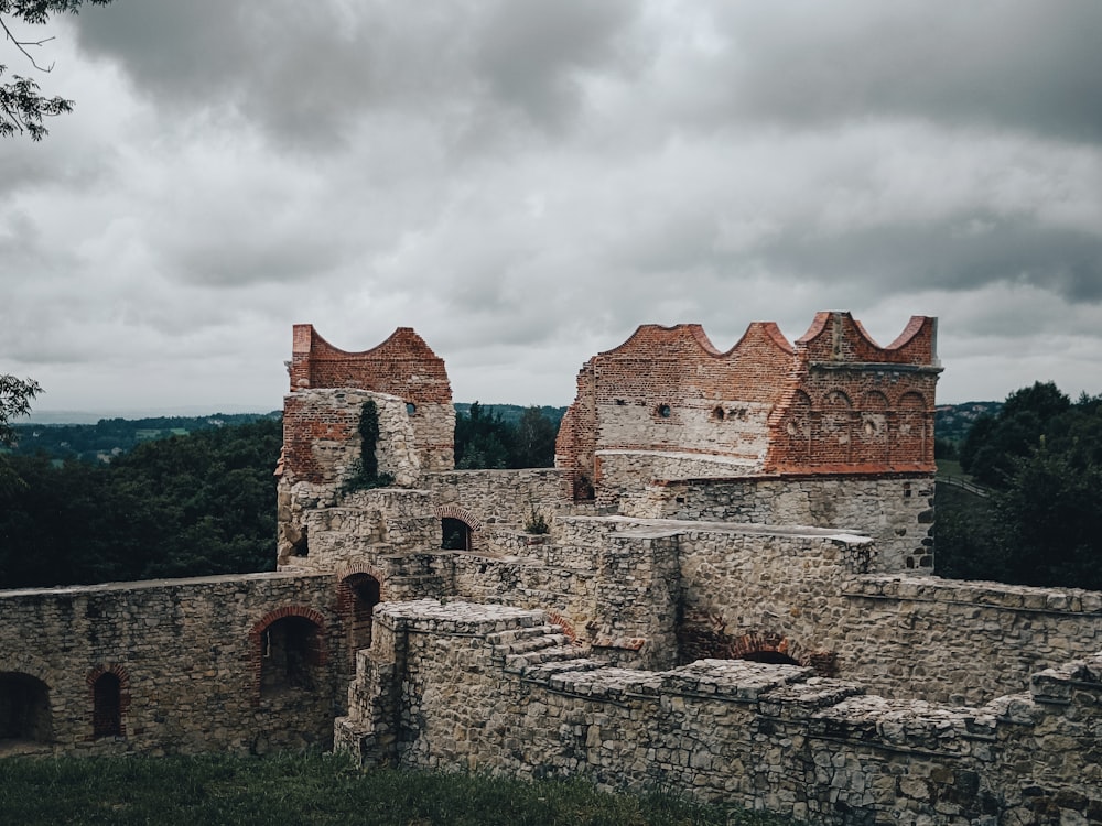 a stone building with a stone wall