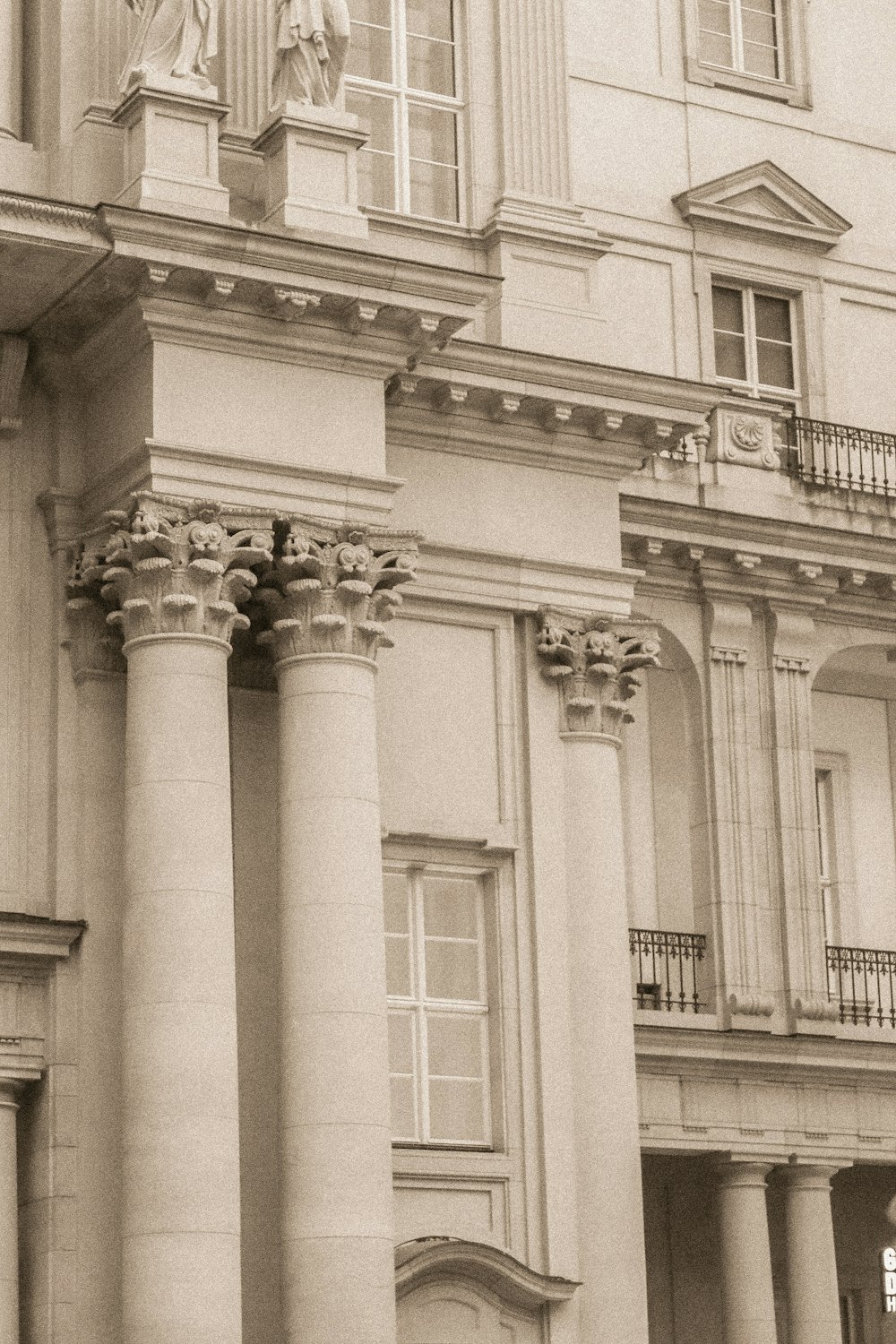 a building with columns and statues