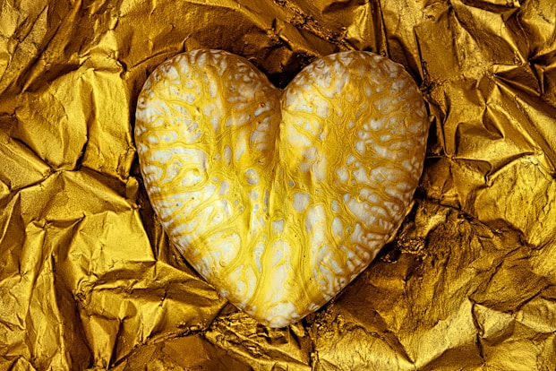 a rock with a design on it