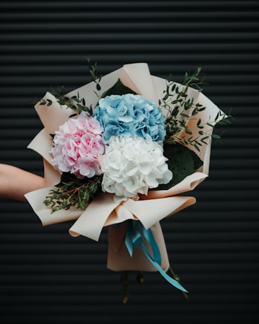 a person holding flowers