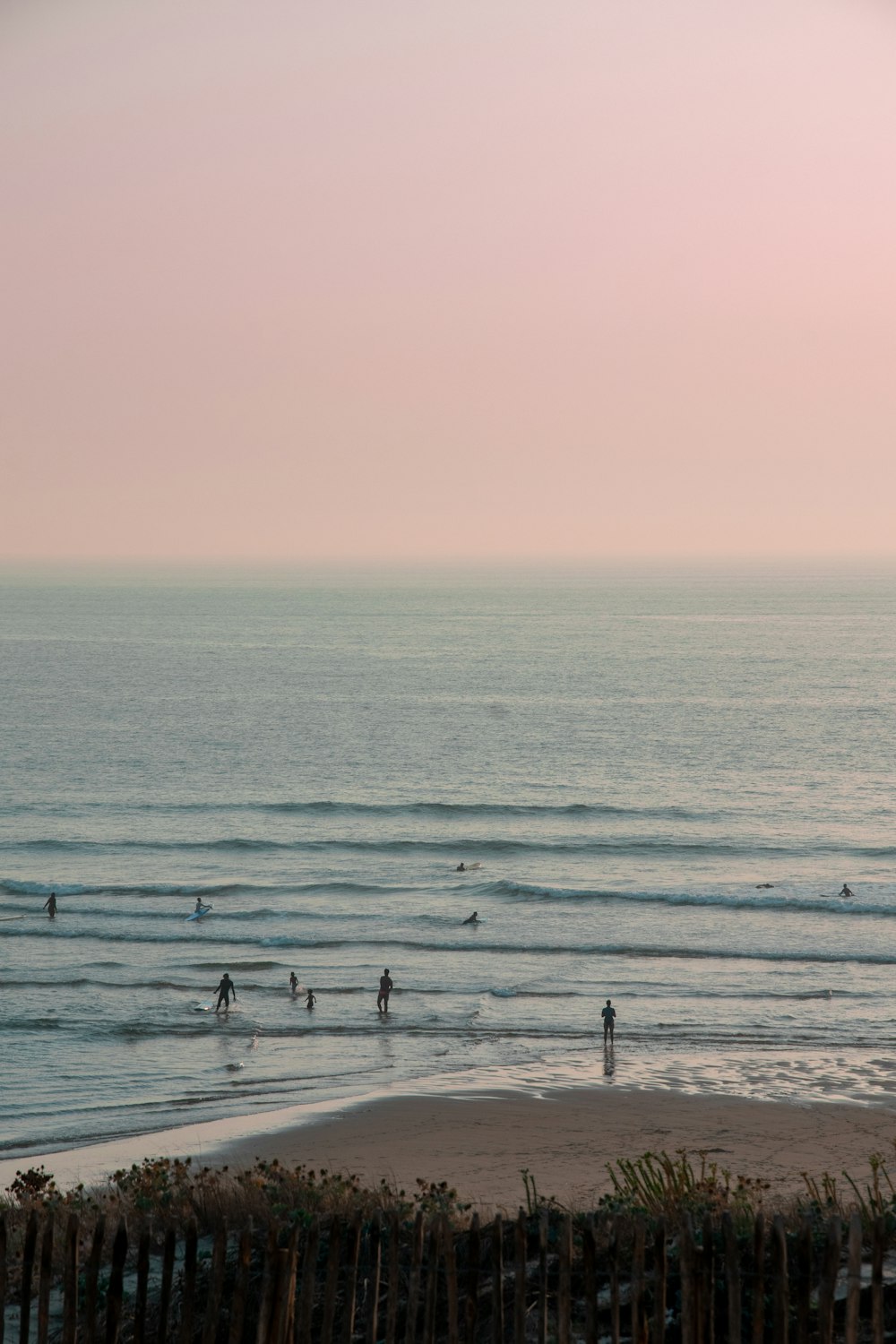 a group of people on a beach