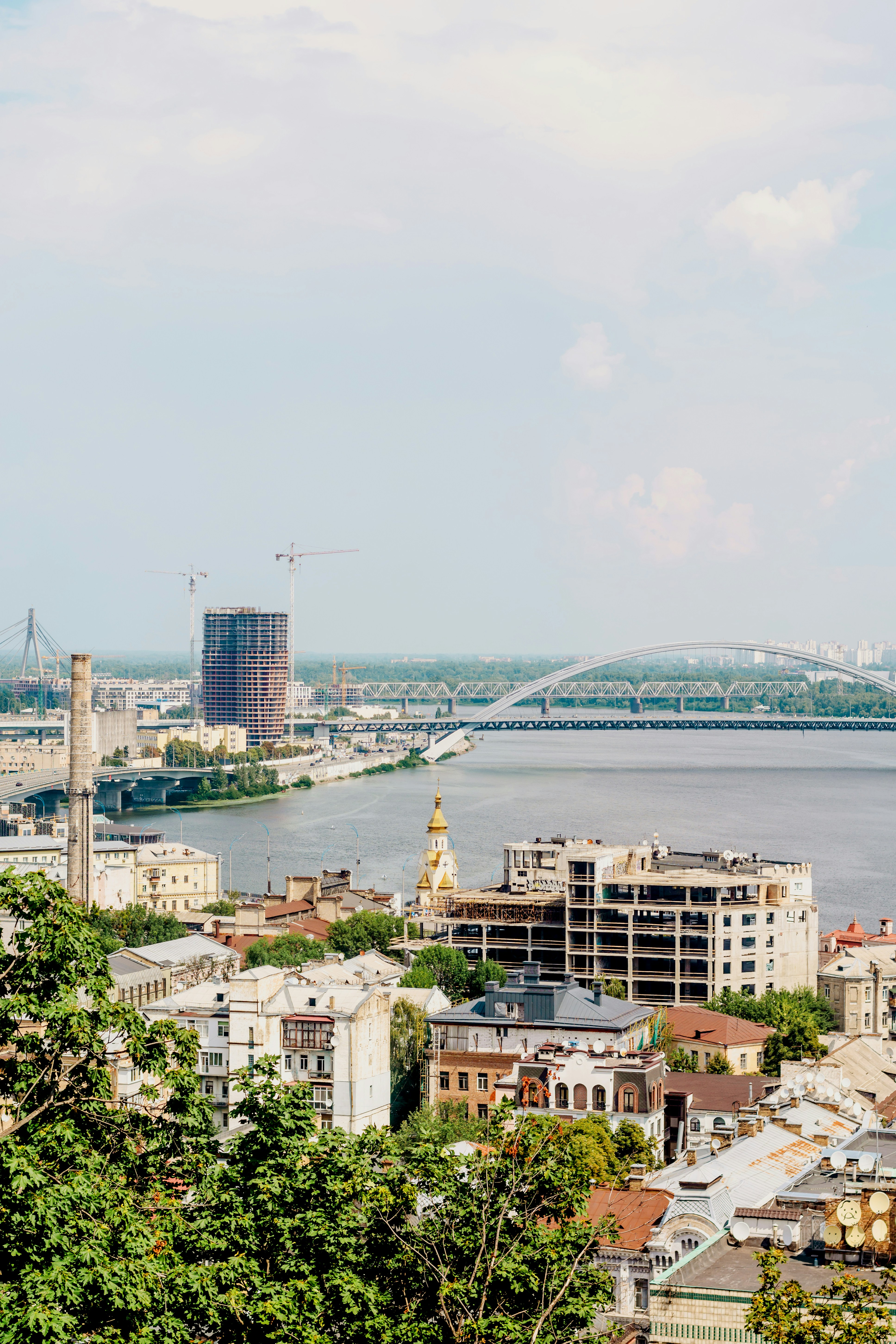 a city with a bridge over a river