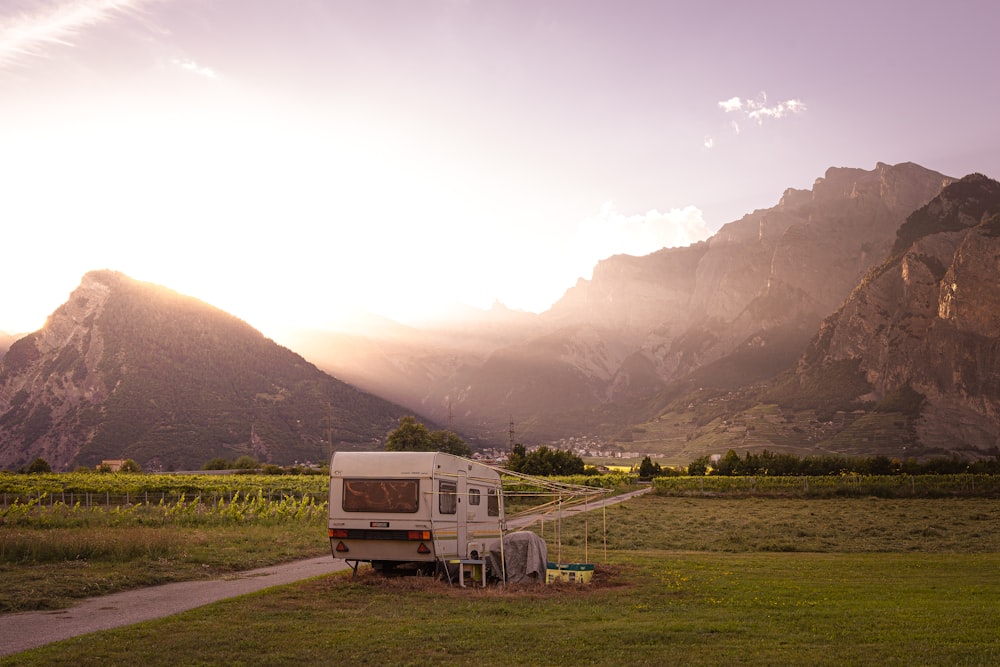 a rv parked in a field