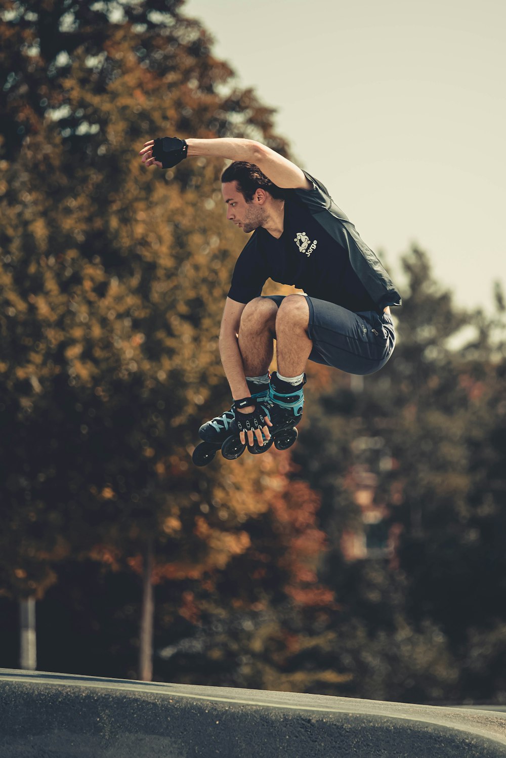 a man doing a trick on a skateboard