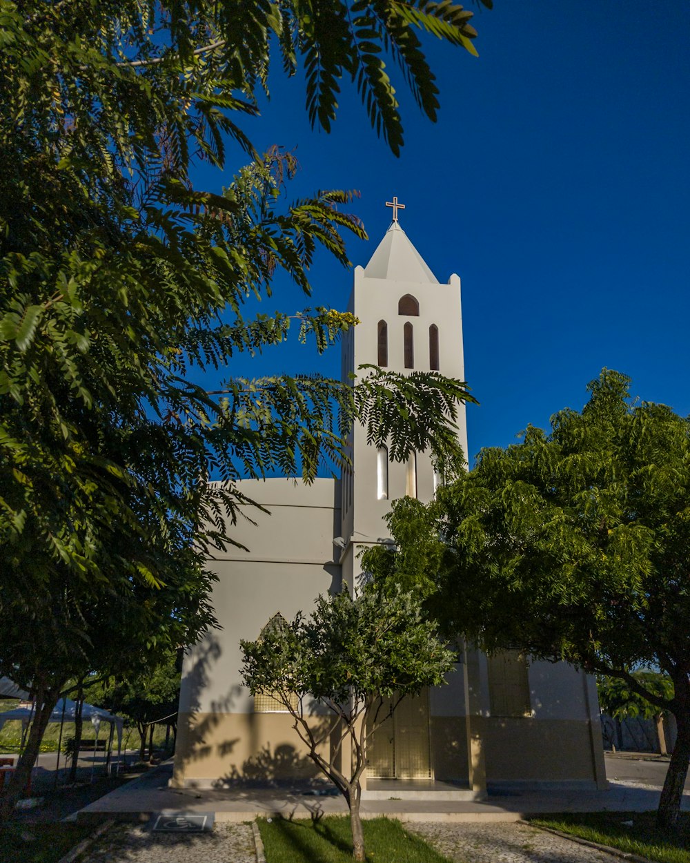 a white church with a cross on top