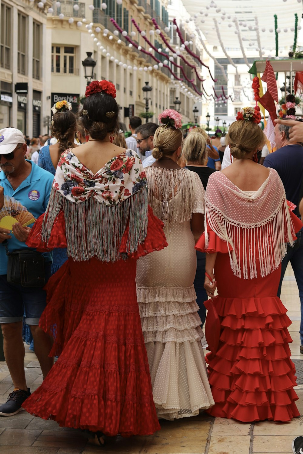 a group of people in dresses