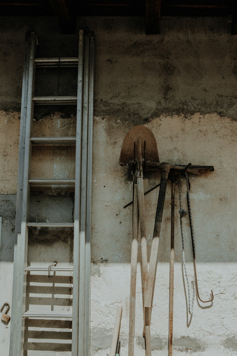 a pair of skis and a ladder in a room