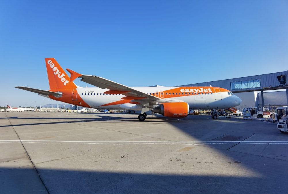 an airplane is parked at an airport