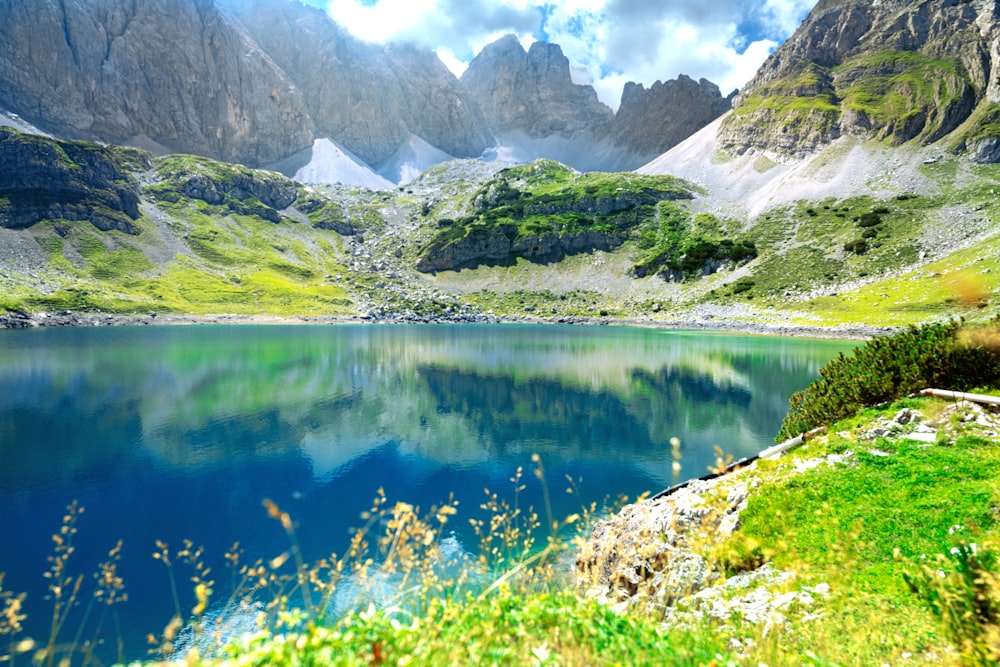 a lake surrounded by mountains