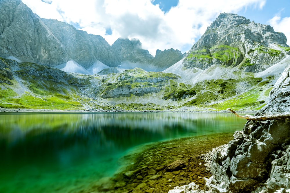 a lake surrounded by mountains