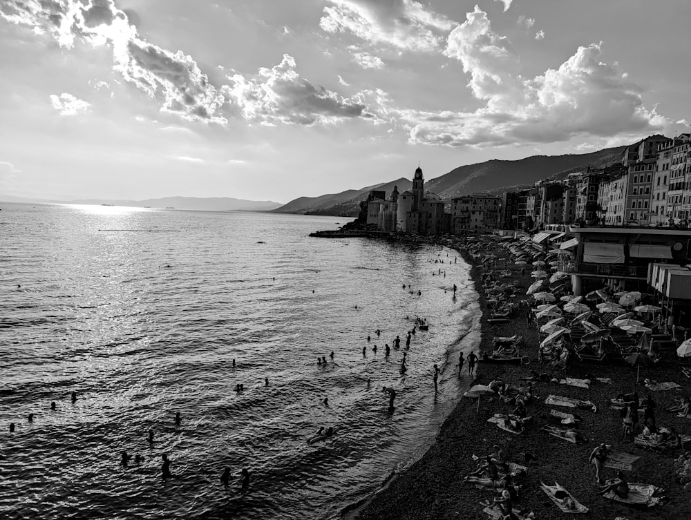 a beach with buildings along it