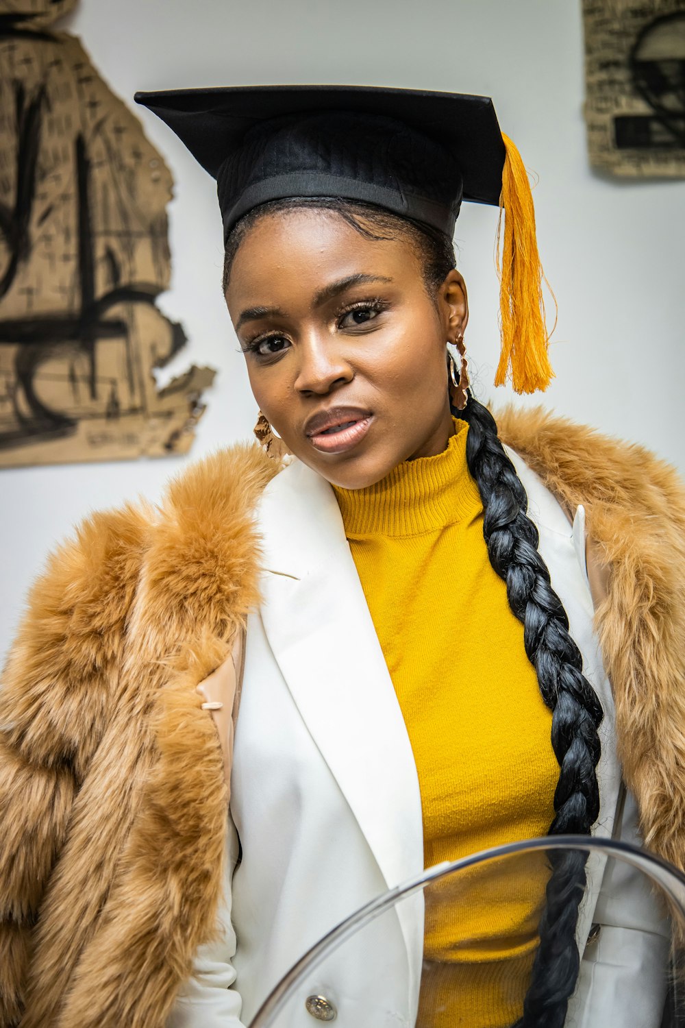 a person wearing a graduation gown