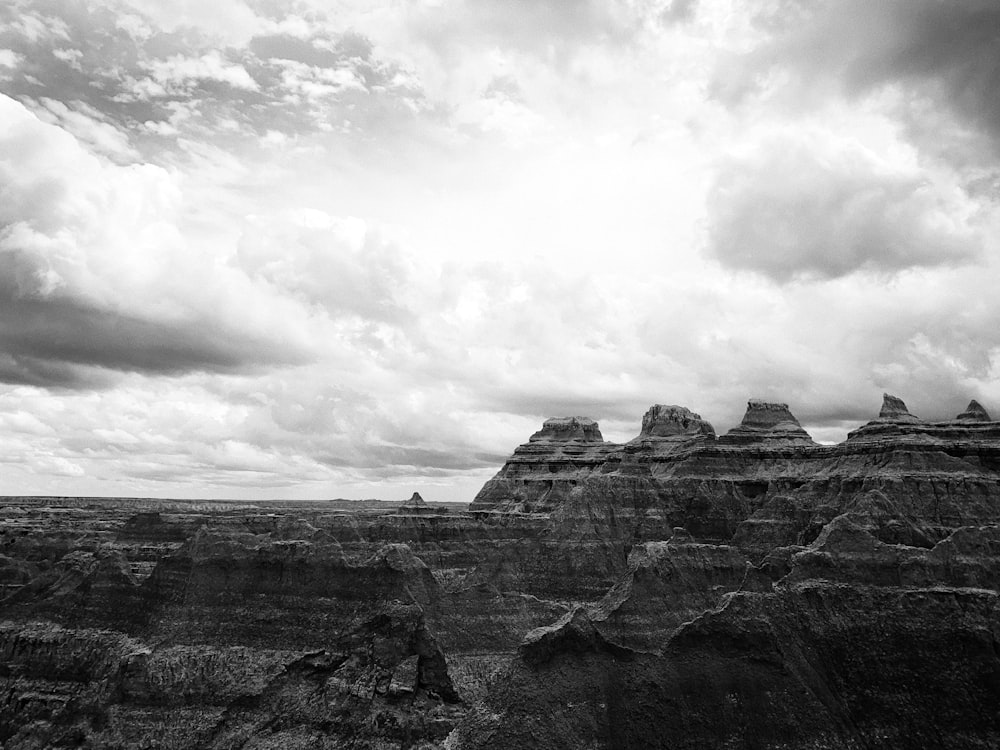 a rocky landscape with clouds