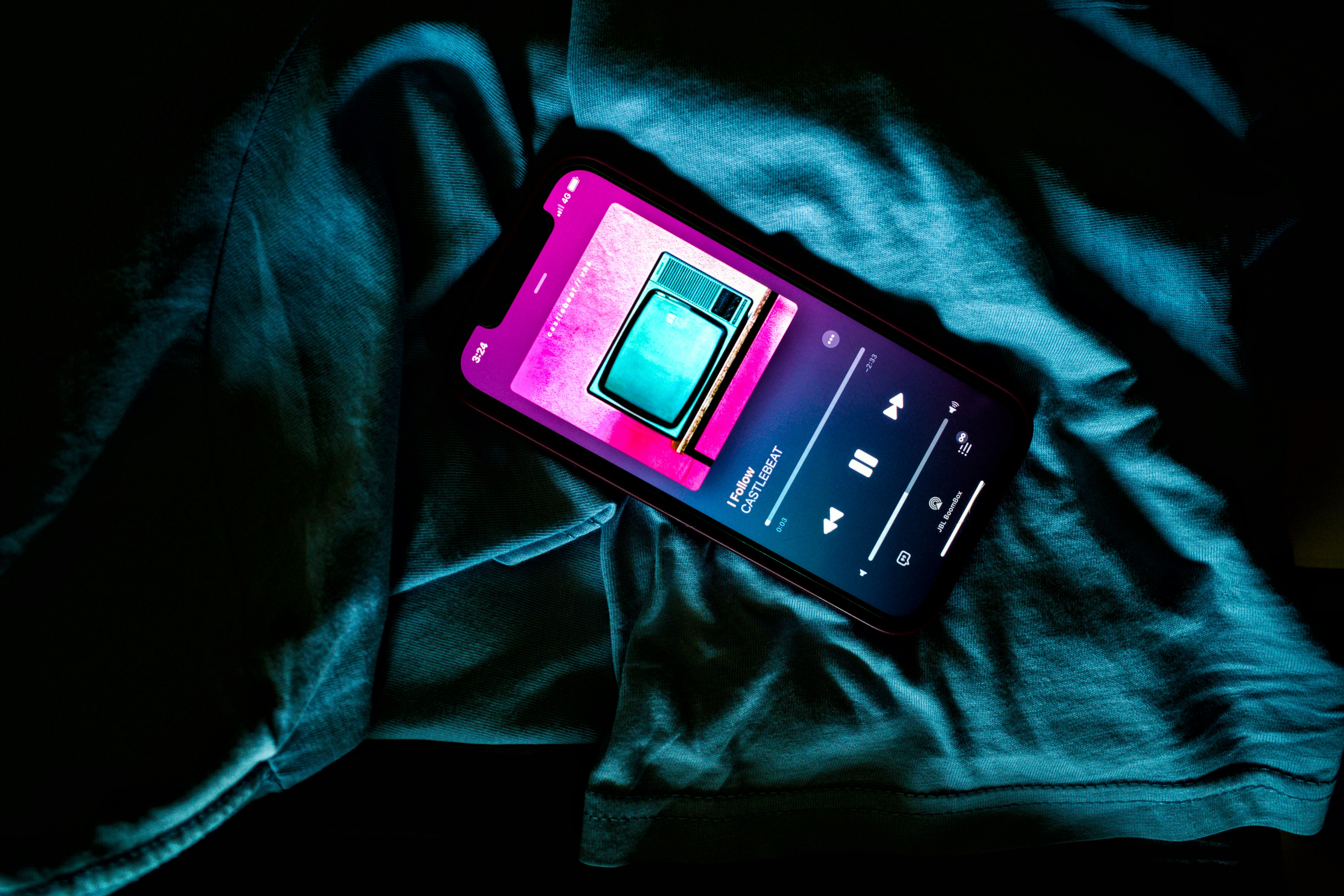 a cell phone on a blanket