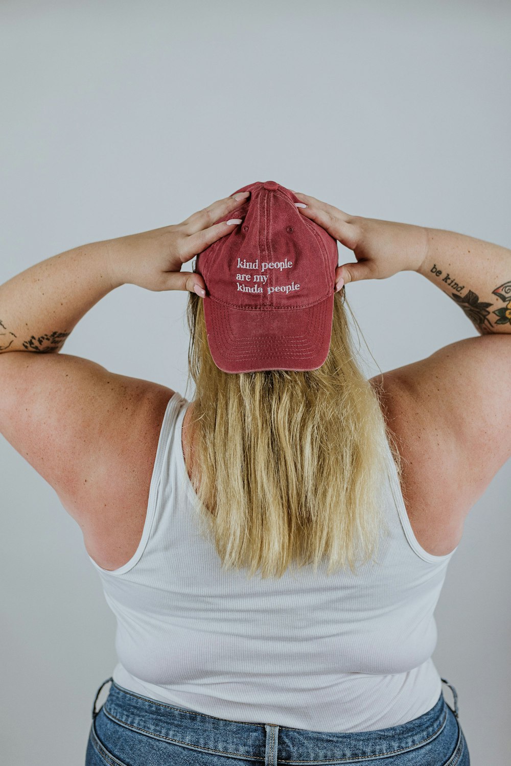 a person holding a red ball