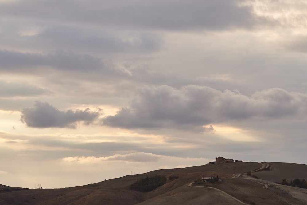 a road with a cloudy sky