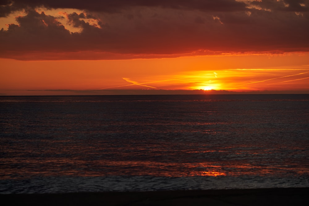 a sunset over the ocean