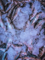 a pile of purple and white crystals