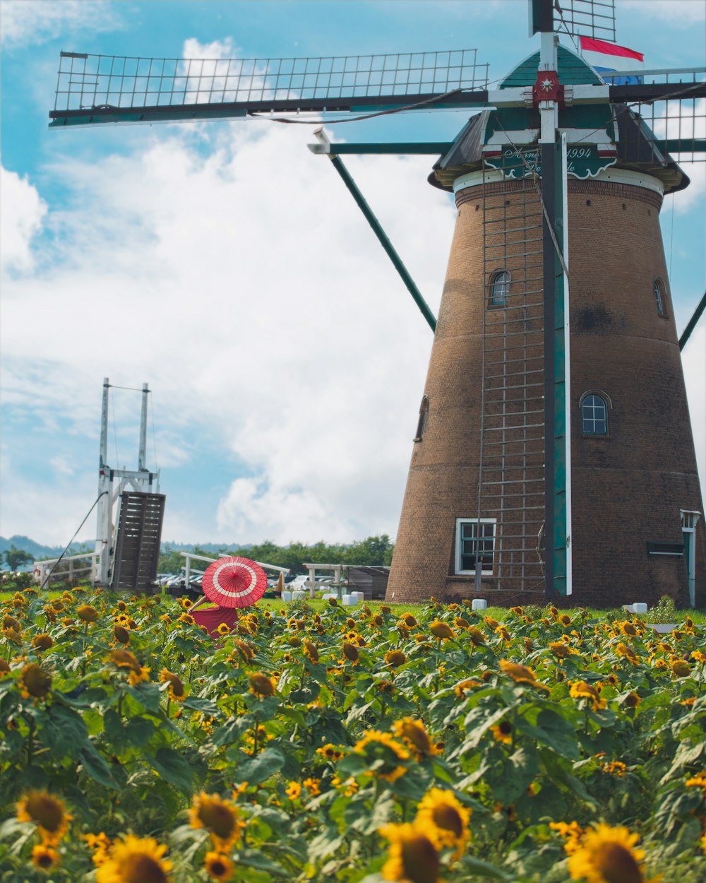 a windmill next to a building