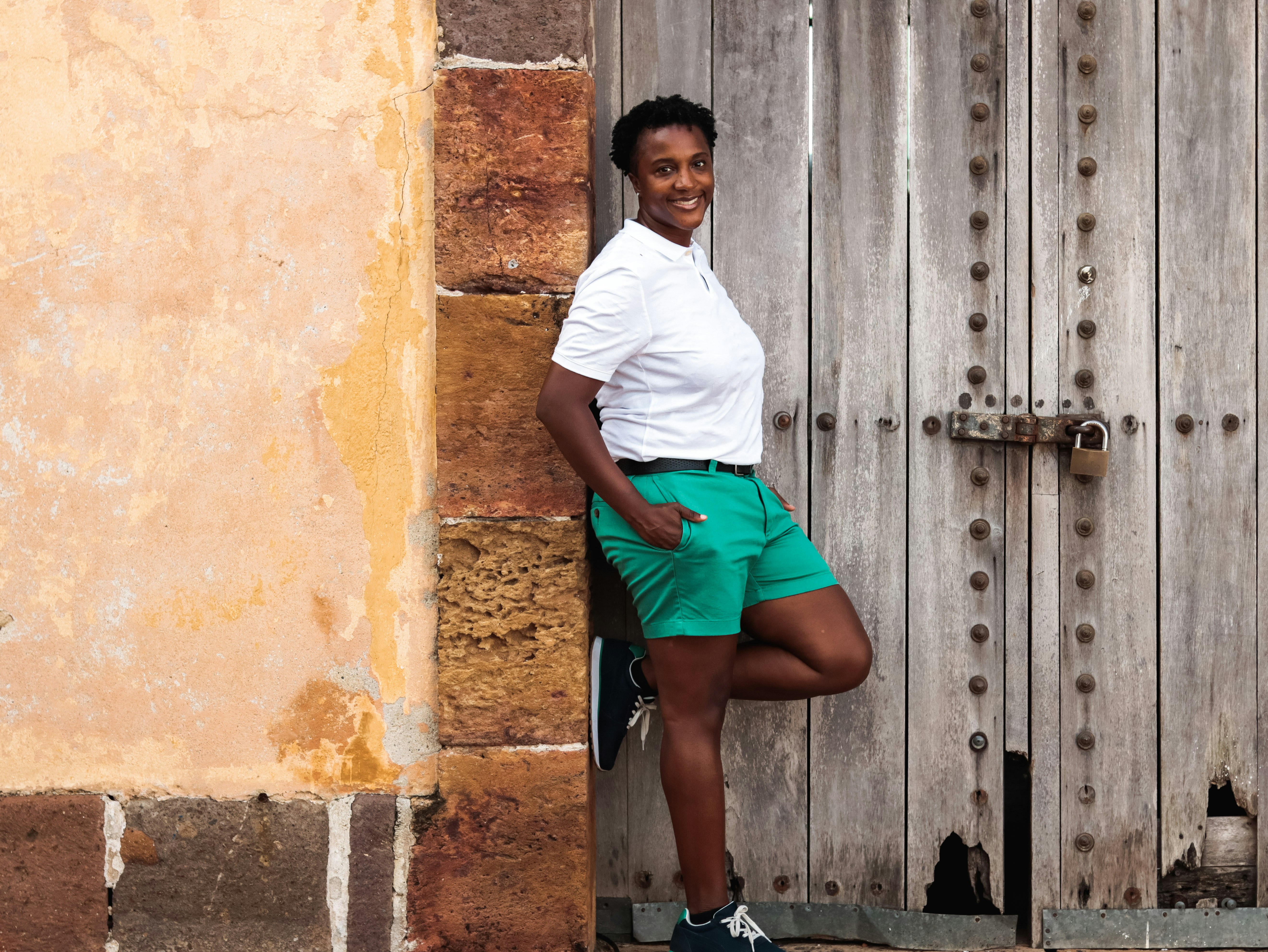 a man sitting on a fence, Casco Viejo in Panama City, Panama