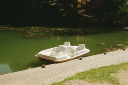 a row of boats on a dock
