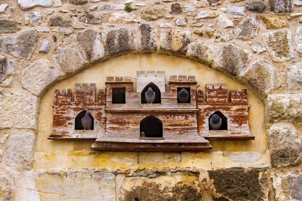 a building with a stone wall