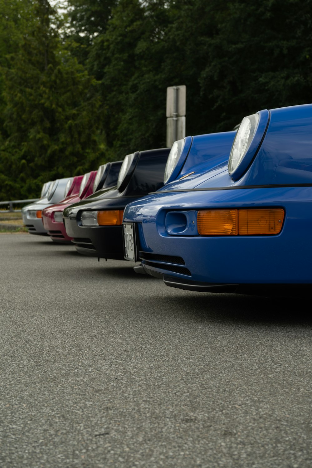 a blue car with its doors open