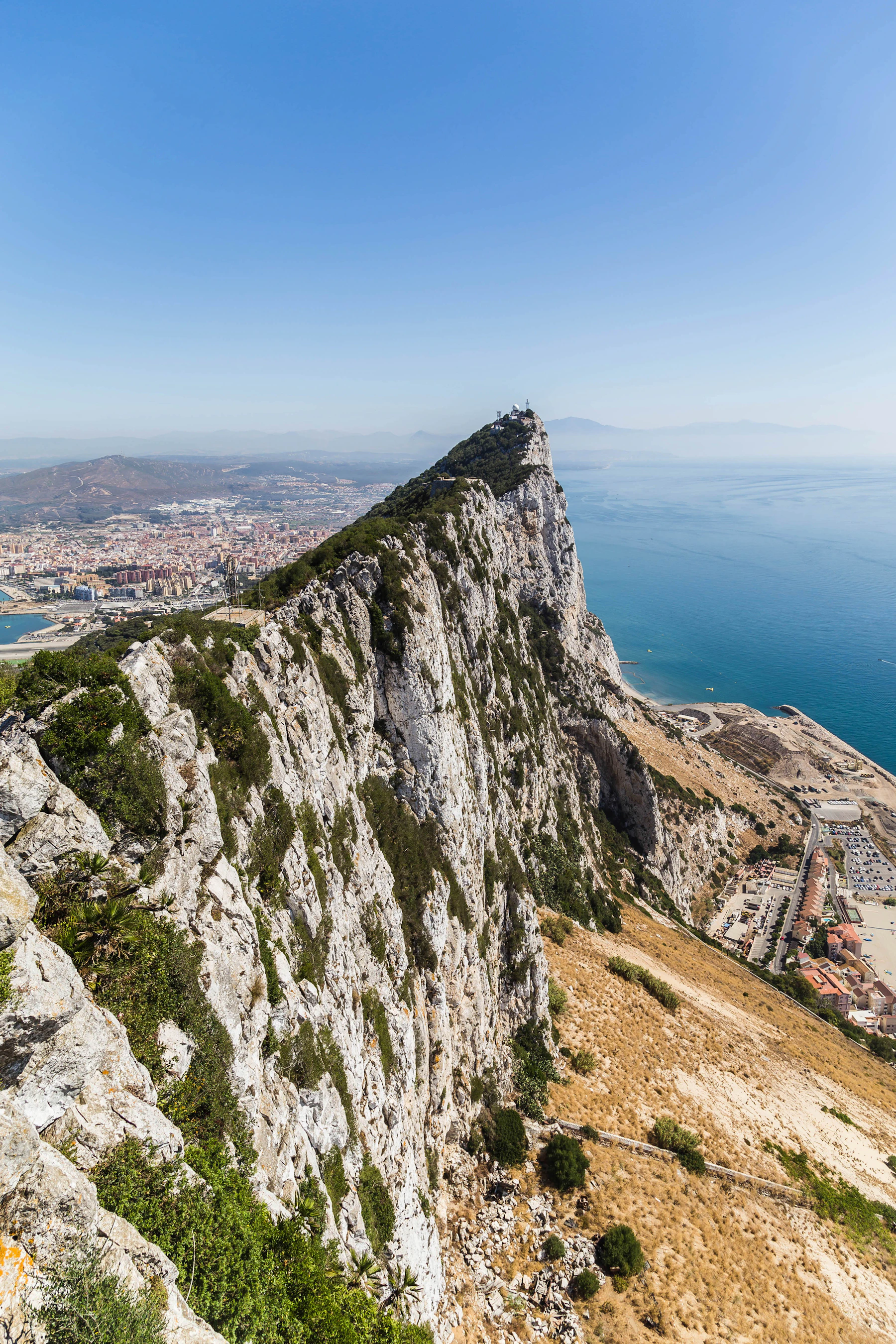 The dramatic limestone ridge of the Rock of Gibraltar above the Mediterranean coast
