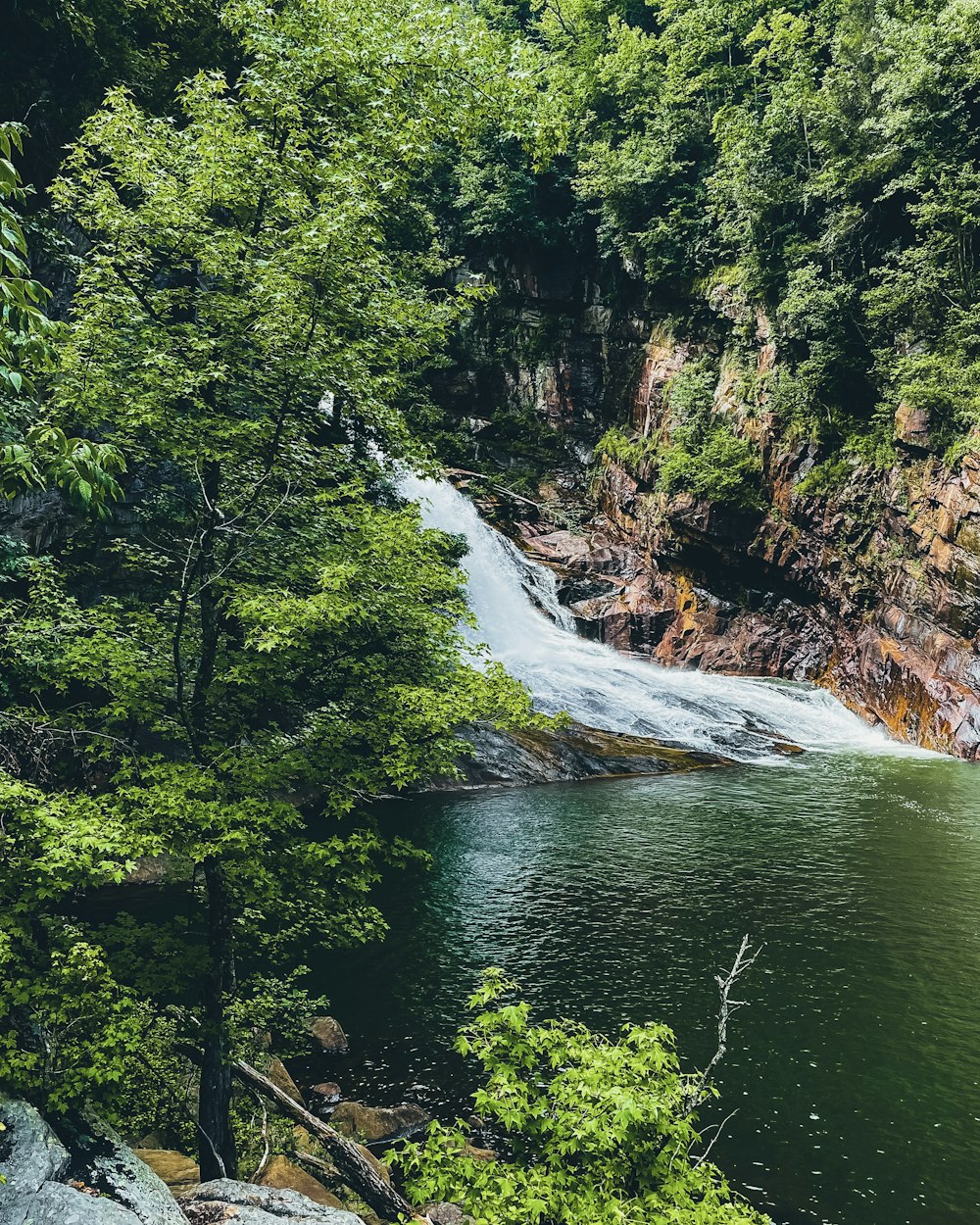 a river with a waterfall