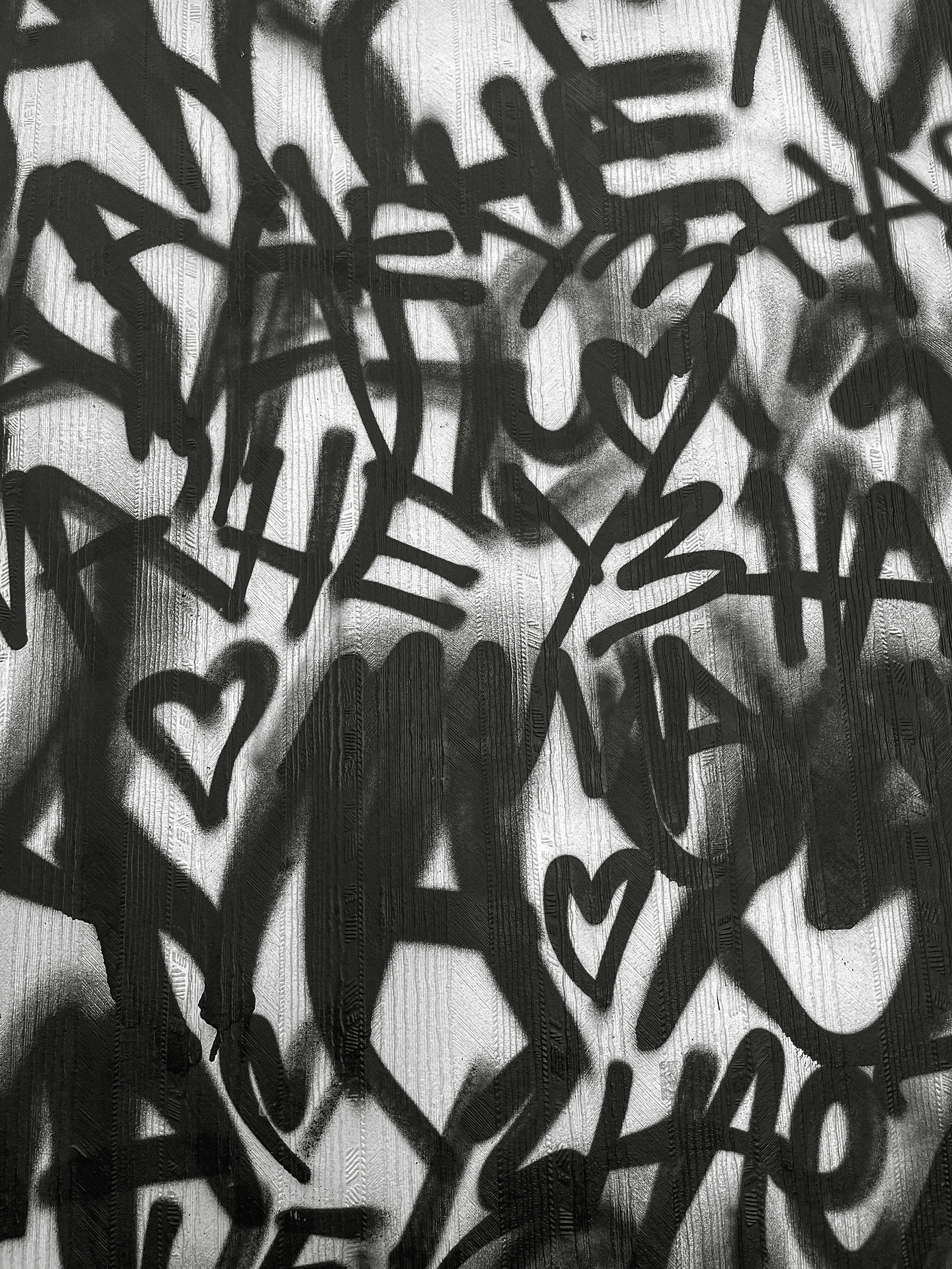 a black and white image of a person's face