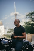 a man sitting on a motorcycle