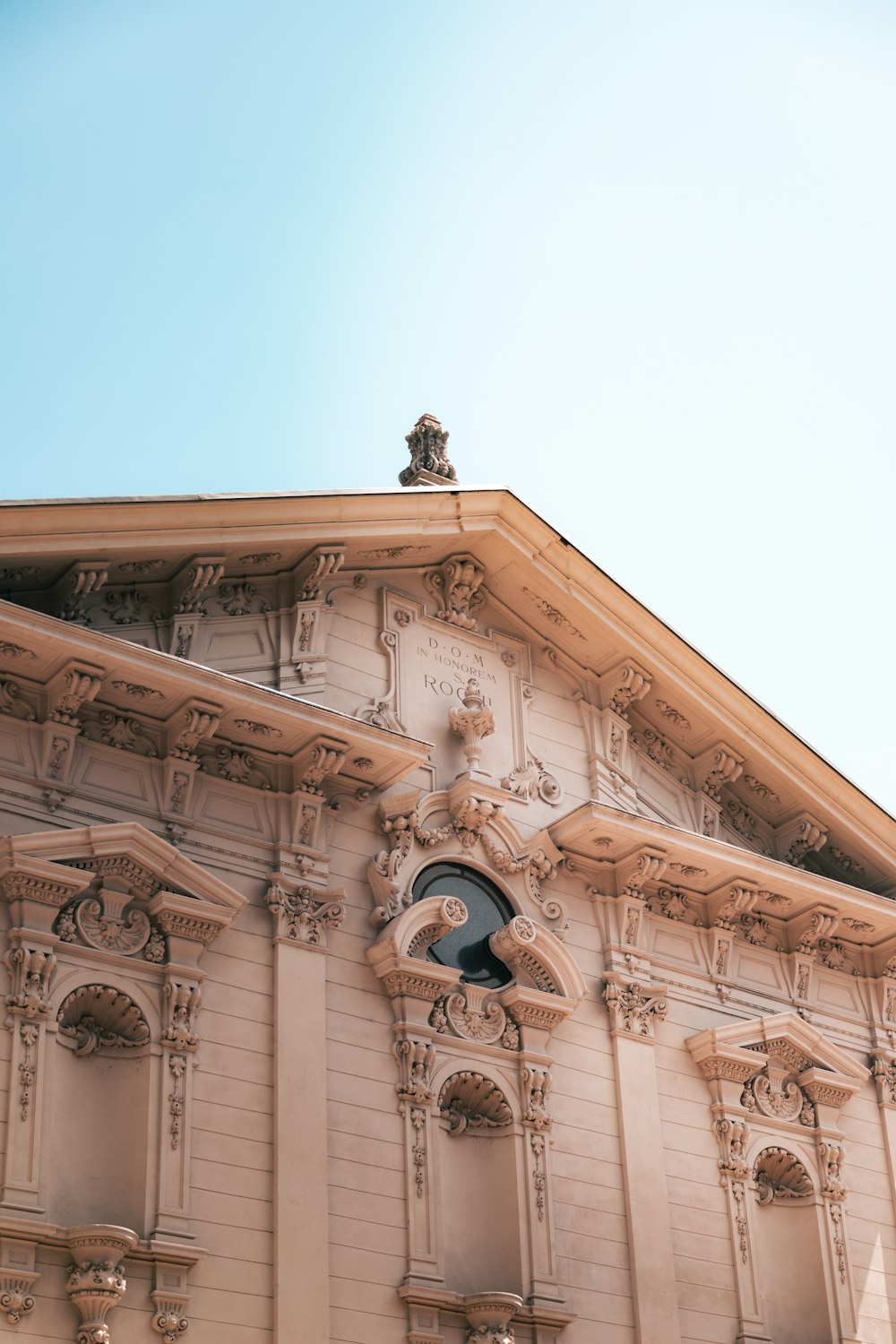 a building with a statue on top